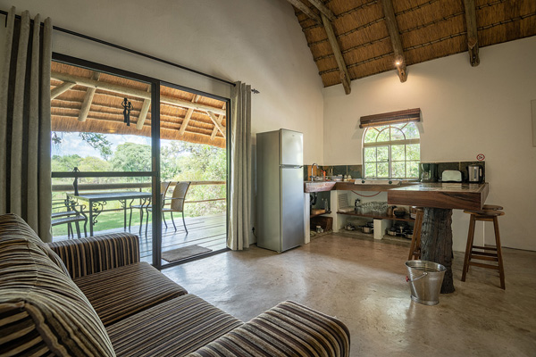 Kitchen, terrace with view on the Okavango